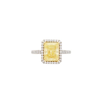 Lot 160 - Platinum, Fancy Yellow Diamond and Diamond Ring