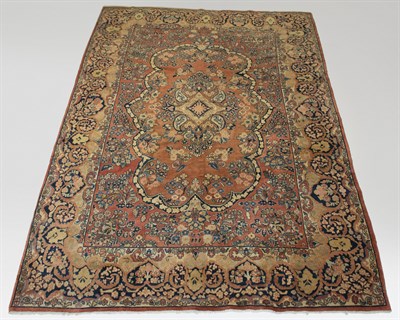 Lot 263 - Sarouk Carpet The central medallion flanked by...