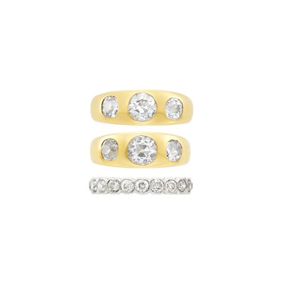Lot 19 - Two Gold and Diamond Gypsy Rings and Platinum, Gold and Diamond Band Ring