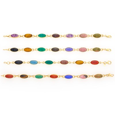Lot 153 - Four Gold and Hardstone Scarab Bracelets
