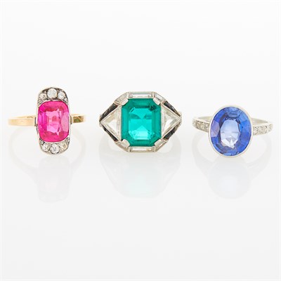 Lot 178 - Three Period Platinum, Gold, Synthetic and Simulated Colored Stones, Diamond and Black Onyx Rings