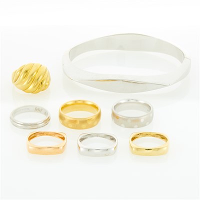 Lot 79 - White Gold Bangle Bracelet and Seven Yellow, White and Rose Gold Rings