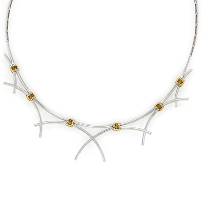 Lot 1062 - Two Color Gold, Diamond and Yellow Diamond Necklace