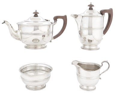Lot 18 - George VI Sterling Silver Tea and Coffee...