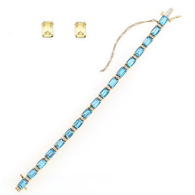 Lot 211 - Pair of White Gold and Yellow Sapphire Earrings and Gold, Blue Topaz and Diamond Bracelet