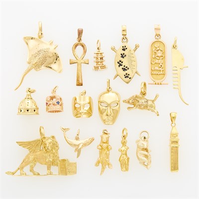 Lot 98 - Fifteen Gold and Two Silver-Gilt Charms