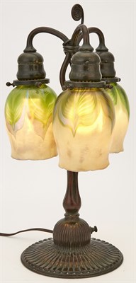 Lot 191 - Tiffany Studios Bronze and Favrile Glass Three-...