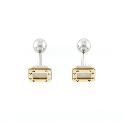 Lot 1046 - Cartier Pair of Stainless Steel and Gold 'Santos' Cufflinks