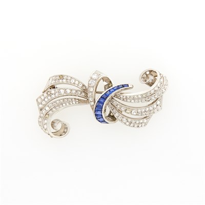 Lot 1091 - Platinum, Diamond and Synthetic Sapphire Brooch