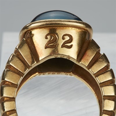 Lot 8 - Van Cleef & Arpels Gold and Cabochon Blue Topaz Ring