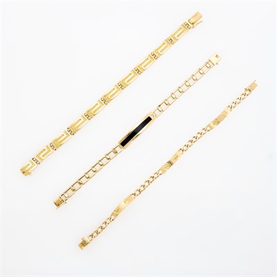 Lot 238 - Three Gold, Black Onyx and Diamond Bracelets