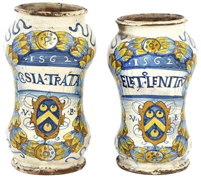 Lot 216 - Two Italian Maiolica Armorial Albarelli Dated...