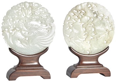 Lot 569 - A Pair of Chinese White Jade Reticulated Round...