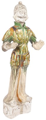 Lot 201 - A Chinese Sancai Glazed Pottery Figure of a...