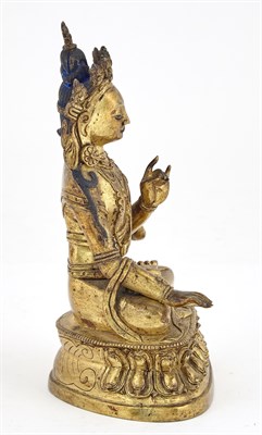 Lot 342 - A Tibetan Gilt Bronze Seated Figure of Tara...