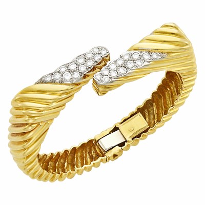 Lot 63 - Two-Color Gold and Diamond Bangle Bracelet