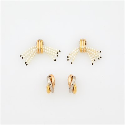 Lot 1031 - Cartier Pair of Tricolor Gold 'Trinity' Huggie Earclips and Pair of Tricolor Gold and Cultured Pearl Fringe Earclips