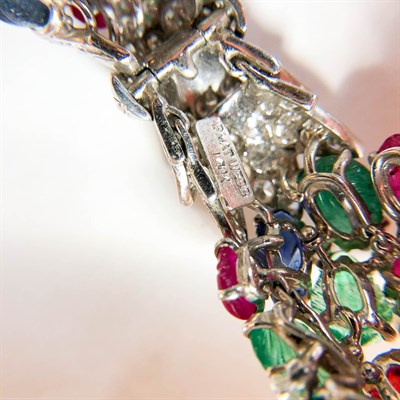 Lot 56 - David Webb Platinum, White Gold, Carved Colored Stone and Diamond 'Tutti Frutti' Bracelet