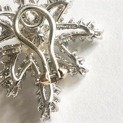 Lot 130 - Tiffany & Co. Pair of Platinum, Cultured Pearl and Diamond 'Fireworks' Earclips