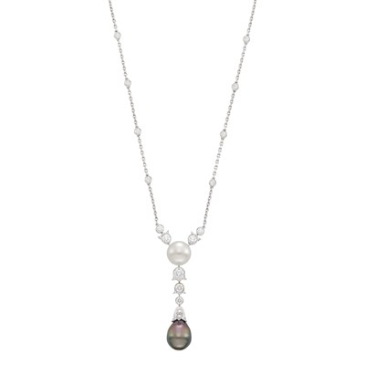 Lot 125 - Cartier White Gold, Tahitian Black and South Sea Cultured Pearl and Diamond 'Daisy' Pendant-Necklace, France