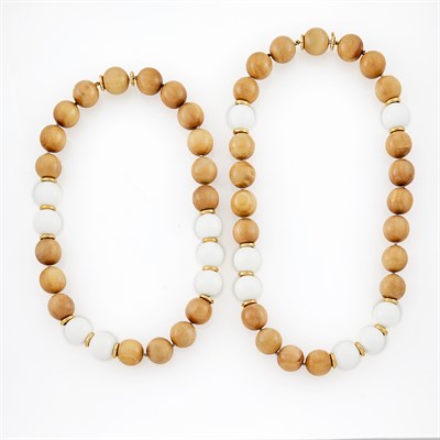 Lot 1029 - Two Gold, Wood and White Agate Bead Necklaces