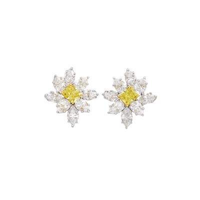 Lot 169 - Graff Pair of Platinum, Gold, Fancy Vivid Yellow Diamond and Diamond Cluster Earclips