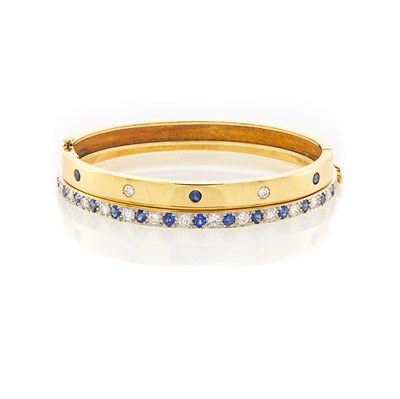 Lot 1027 - Cartier Gold, Sapphire and Diamond Bangle Bracelet and Gold, Platinum, Diamond and Sapphire Bangle Bracelet
