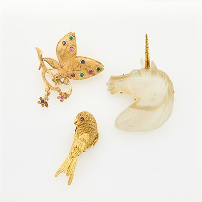 Lot 1187 - Three Gold, Gem-Set and Frosted Rock Crystal Brooches