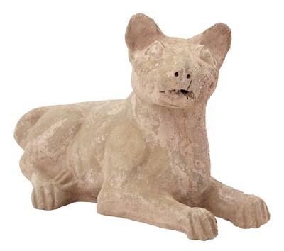 Lot 186 - A Chinese Pottery Figure of a Recumbent Dog...