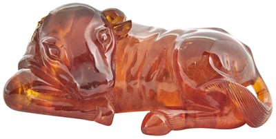 Lot 404 - A Small Chinese Amber Carving of a Recumbent...