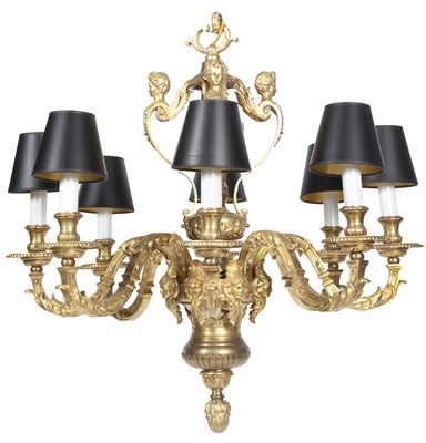 Lot 254 - Louis XIV Style Ormolu Eight-Light Chandelier...