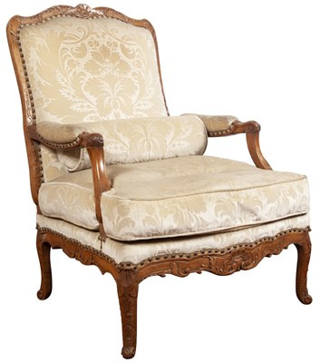 Lot 18 - Regence Upholstered Carved Beechwood Fauteuil...