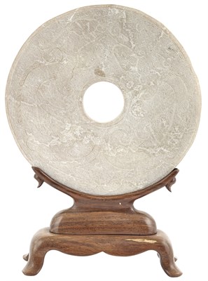 Lot 126 - An Archaistic Chinese Calcified Jade Bi Disc...