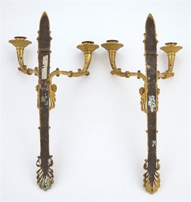 Lot 195 - Pair of Empire Ormolu Two-Light Wall Lights...