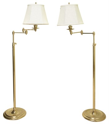 Lot 287 - Pair of Brass Adjustable Swing-Arm Floor Lamps...
