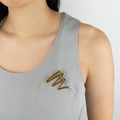 Lot 5 - Tiffany & Co., Paloma Picasso Gold, Platinum and Diamond 'Zig Zag Scribble' Brooch