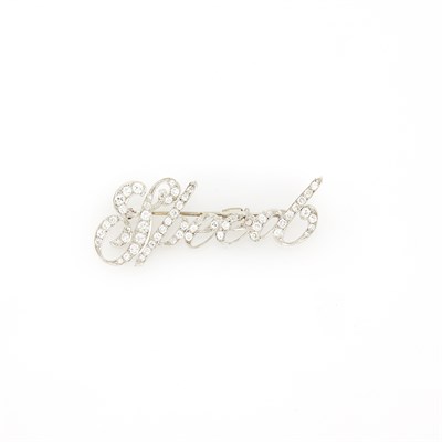 Lot 1255 - Low Karat White Gold and Diamond 'Speed' Brooch