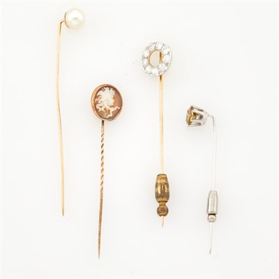 Lot 1141 - Four  Diamond, Colored Diamond, Cultured Pearl and Cameo Stickpins