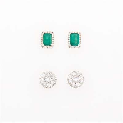 Lot 103 - Pair of White Gold, Emerald and Diamond Stud Earrings and White Gold and Diamond Floret Stud Earrings