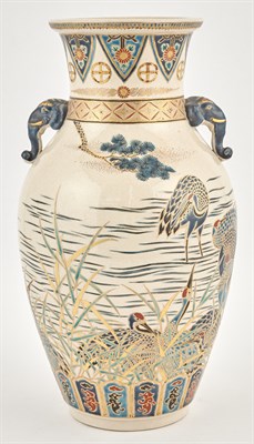 Lot 168 - A Japanese Satsuma Earthenware Twin-Handled...