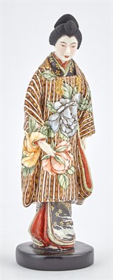 Lot 136 - A Japanese Satsuma Earthenware Figure of a...