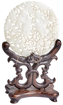 Lot 69 - A Chinese White Jade Reticulated Round Plaque...