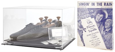 Lot 178 - [SINGIN' IN THE RAIN] Donald O'Connor's tap...