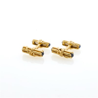 Lot 53 - Tiffany & Co. Pair of Gold and Cabochon Sapphire Cufflinks