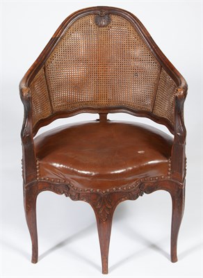 Lot 503 - Early Louis XV Walnut and Caned Fauteuil de...