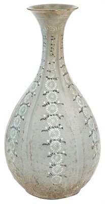 Lot 329 - A Korean Slip-Decorated Celadon Bottle Vase...