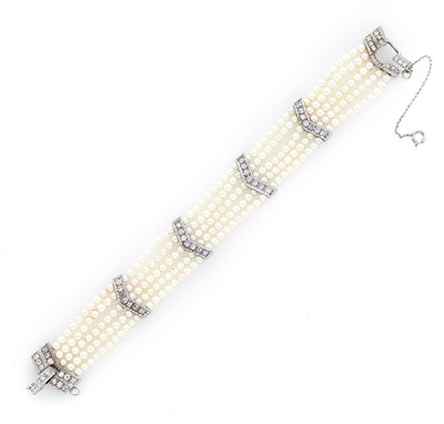 Lot 84 - Five Strand Cultured Pearl, White Gold and Diamond Bracelet