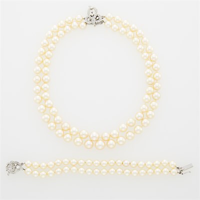 Lot 177 - Double Strand Cultured Pearl Necklace and Bracelet with White Gold and Diamond Clasps
