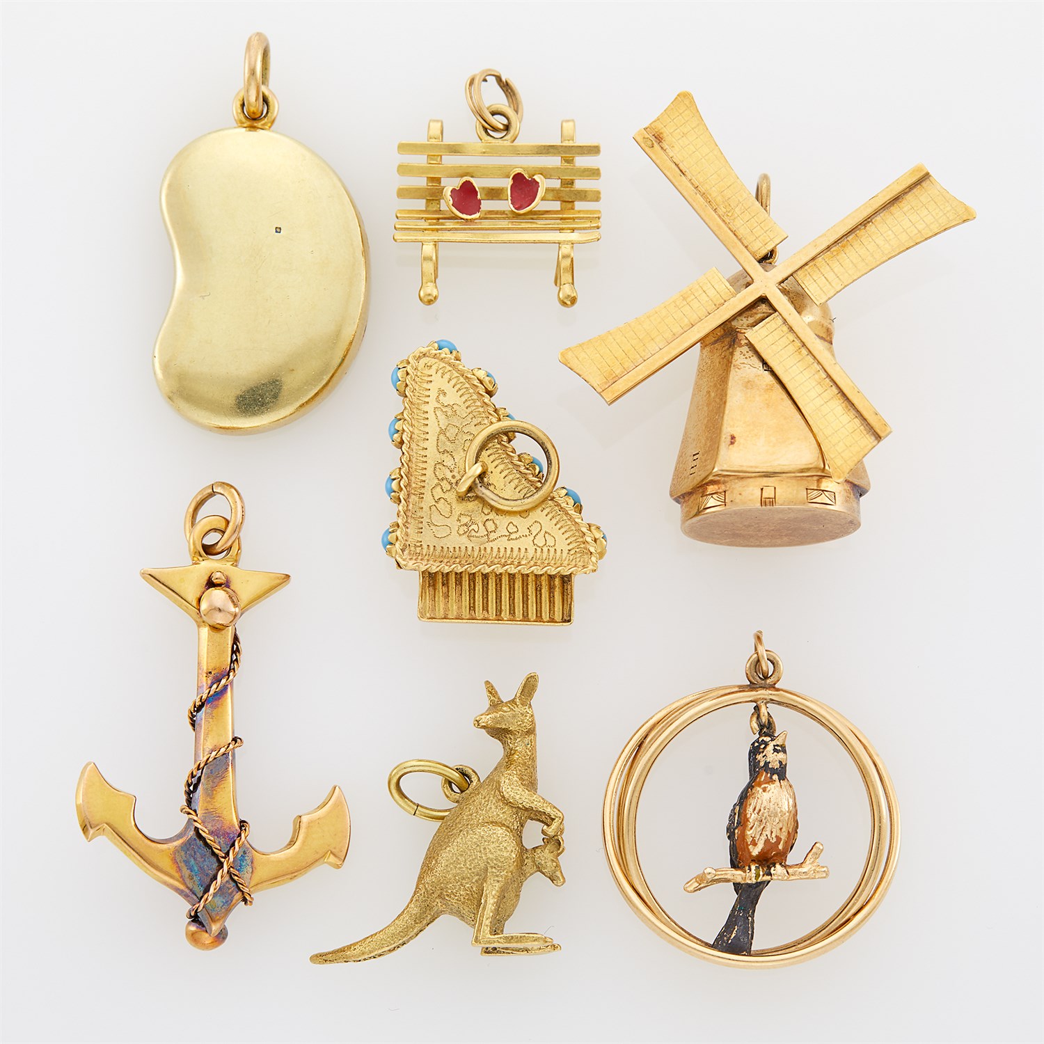 Lot 151 - Seven Gold Charms