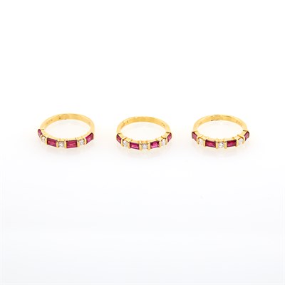 Lot 220 - Three Gold, Ruby and Diamond Band Rings